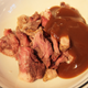 Steak and gravy in a microwave bowl